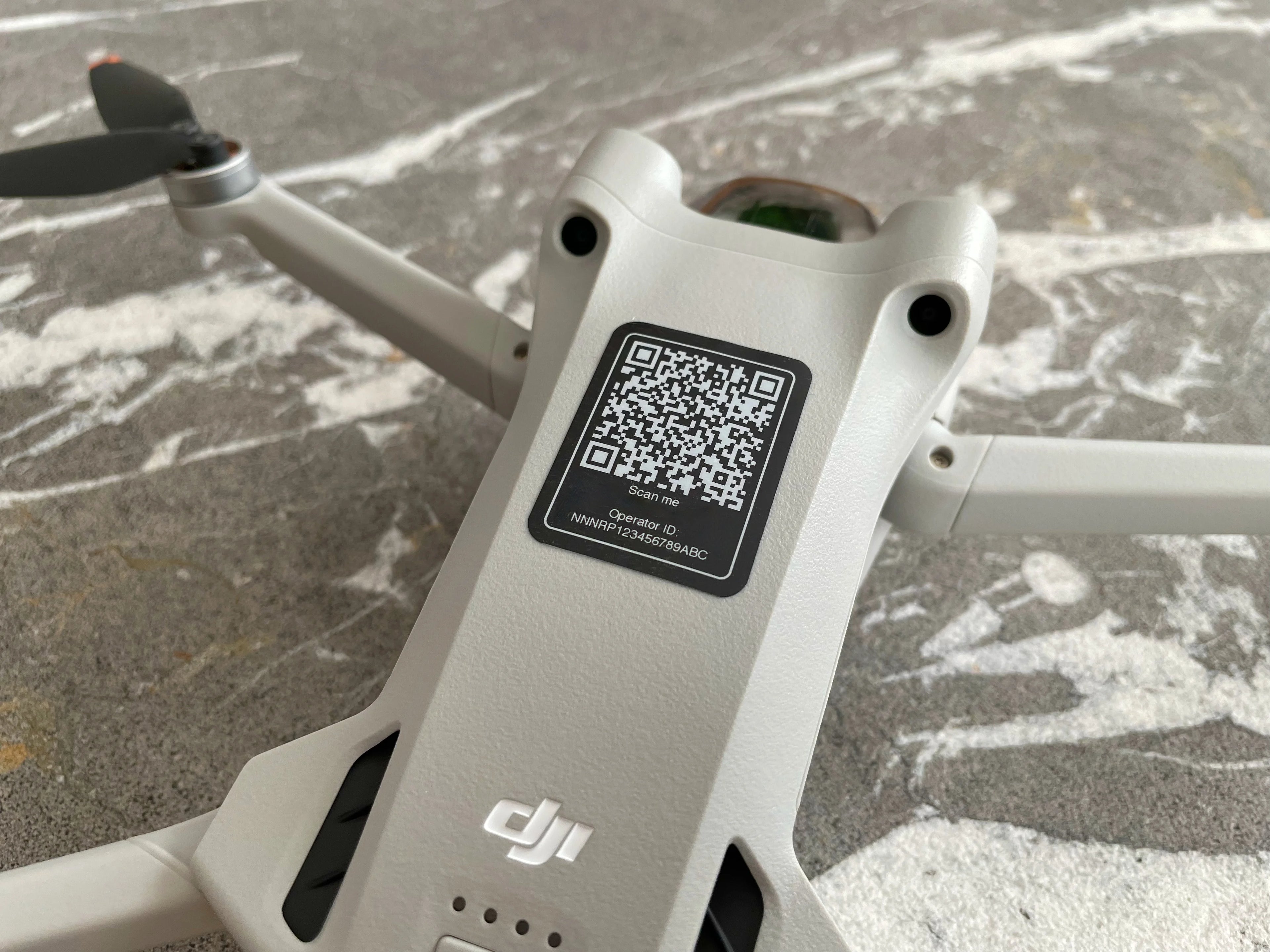 Drone with QR code label on a textured surface