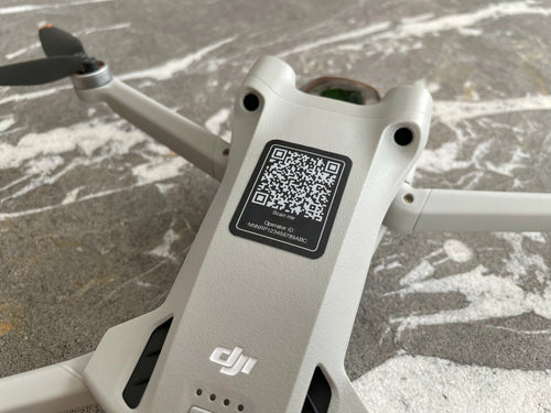 Drone with QR code label on a textured surface
